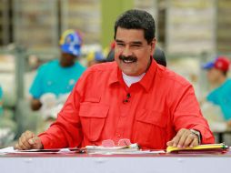 El gobierno denunció que la crisis es producto de una guerra económica de empresarios para provocar descontento popular. AFP / Presidencia de Venezuela