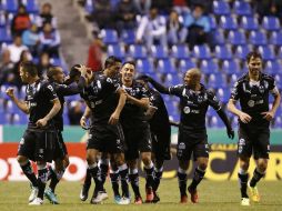 Los goles de la victoria fueron obra de Jesús Molina y Edwin Cardona. MEXSPORT /