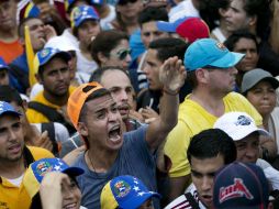 El retraso de un mes en la divisa provocó violentas protestas, cuatro muertes y cientos de saqueos. AP / ARCHIVO