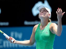 Con los termómetros en 40 grados durante el partido, la danesa cayó en un duelo que se prolongó tres horas y 19 minutos. AFP / G. Nycholls