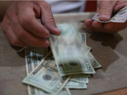 Ayer, la moneda de EU cerró en 22.10 pesos por unidad. EL INFORMADOR / G. Gallo