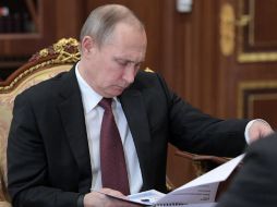 Al hablar sobre supuestas actividades sexuales de Trump en Rusia, Putin dice que quienes lo difundieorn son peores que prostitutas. AP / A. Druzhinin