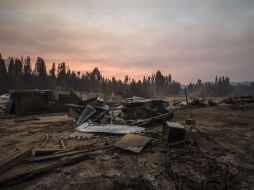 En O'Higgins 36 personas fueron afectadas, el fuego destruyó nueve viviendas, tres bodegas y tres vehículos. EFE / H. Scott