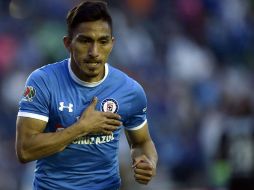 Mena celebra el primer tanto de la Máquina. AFP / P. Pardo