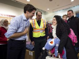 El mandatario de Canadá  tuiteó: 'la diversidad es nuestra fuerza #BienvenidosaCanadá'. AP / N. Danette