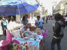 En lo referente al comercio en espacios abiertos, el aumento por el pago de licencias fue de 57 por ciento. EL INFORMADOR / ARCHIVO