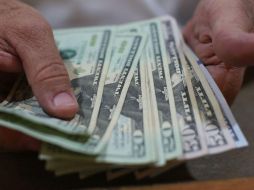 La moneda de origen estadounidense concluyó en siete centavos menos respecto al cierre previo. EL INFORMADOR / ARCHIVO