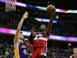 John Wall fue el mejor anotador de los Wizards. AP / M. Balce