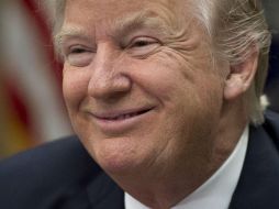 'No conozco a Putin, no tengo tratos en Rusia, y los que odian se están volviendo locos', declaró el mandatario vía Twitter. AFP / S. Loeb