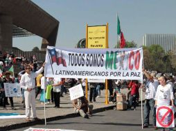Los asistentes portan en su mayoría atuendos blancos y otros portan playeras de la Selección mexicana. NTX / G. Granados