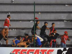 Según dicen los medios, jugadores de Tigres habrían pedido a la seguridad imponer el orden, sin que esto llegara a concretarse. AFP / M. Calls