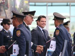 Salvador Cienfuegos, secretario de la Defensa Nacional, y Aristóteles Sandoval en la graduación de cadetes del Colegio del Aire. EL INFORMADOR / R. Tamayo