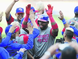 En dos enfrentamientos ante Venezuela en el Clásico Mundial de Beisbol, Puerto Rico conectó 27 imparables y anotó 24 carreras. AFP / D. Poroy
