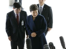 Park hizo una breve intervención en la que se limitó a decir que responderá a las preguntas de los investigadores 'escrupulosamente'. AP / K. Hong-ji