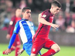 Pulisic hizo un gol contra Honduras y dio tres asistencias, en la goleada por 6-0, que marcó el resurgimiento de la Selección de EU. AFP /