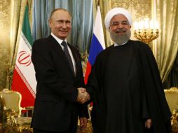 Hasan Rohani de Irán y Vladimir Putin de Rusia, destacan intensificación de actividades terroristas en diferentes regiones del planeta. EFE / S. Karphukhin