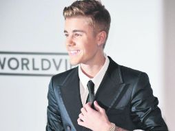 Justin fue fotografiado en el instante en el que estaba pintarrajeando el hotel. AFP /