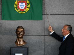 'Una escultura es una escultura y una fotocopia es una fotocopia', dice Santos AFP / F. Leong