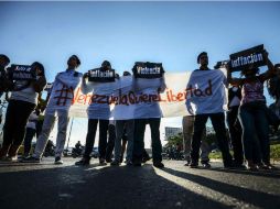 Apenas unos cuantos salieron a las calles para manifestarse en contra de la opresión. AFP / J. Barreto