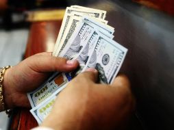 La divisa de origen estadounidense se compró en un mínimo de 17.60 pesos. EL INFORMADOR / ARCHIVO