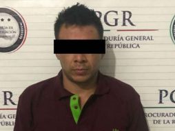 Al detenido se le aseguró un arma larga y 117 envoltorios con cocaína. ESPECIAL / PGR