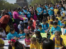 ‘Que no sigan las redadas, que haya más protección para los migrantes’, expresaron los asistentes a la protesta. EFE / S. Thew