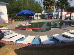 La madre del niño fue quien lo encontró sin vida en una de las albercas del sitio. ESPECIAL /