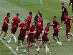 Los jugadores del Atleti entrenan, de cara a su siguiente compromiso liguero. EFE / J. C. Hidalgo