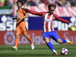 El cuadro Colchonero sobrevivió al asedio visitante en el tiempo suplementario. AFP / J. Soriano
