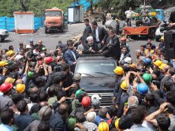 El presidente iraní, Hasan Rohaní, visitó ayer la zona, donde recibió diversas críticas. AFP / PRESIDENCIA DE IRÁN