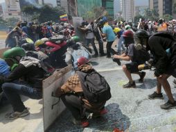 Este jueves se registró una nueva protesta en rechazo por la muerte de un joven periodista en una protesta contra el gobierno. AP / F. Llano