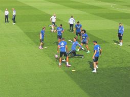 Los jugadores del Real Madrid se muestran tranquilos durante el entrenamiento realizado en Valdebebas. EFE /