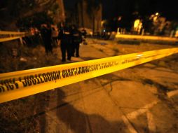 Policías atienden una escena del crimen. ESPECIAL / Archivo