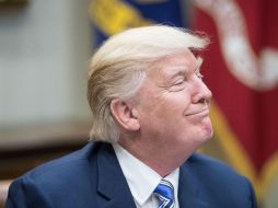 ‘El muro será una gran ayuda y sucederá, créanme’, expresó el mandatario estadounidense. AFP / N. Kamm