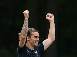 Griezmann y el Atlético de Madrid, a la espera del anuncio oficial. AFP / F. Fife