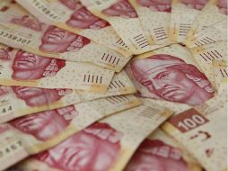 La divisa mexicana inició con una apreciación respecto al dólar, junto a otras economías emergentes productoras de materias primas. EL INFORMADOR / A. Camacho