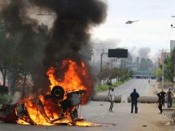 En junio de 2016, un operativo policiaco que buscaba dispersar un bloqueo de la CNTE saldó ocho muertos y un centenar de heridos. AP / ARCHIVO