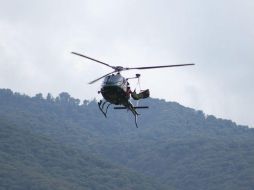 El escuadrón de rescate procedió a recuperar el cuerpo con el uso de un torno y después llevarlo a IJCF. ESPECIAL /