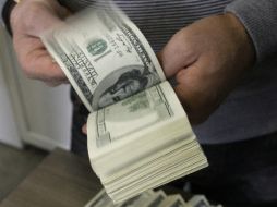 Prevén que el tipo de cambio se cotice entre 17.65 y 17.85 pesos por dólar. EL INFORMADOR / ARCHIVO