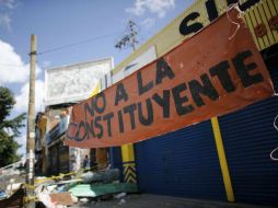 Una pancarta en contra de la Asamblea Constituyente a ser votada mañana domingo 30 de julio. AP / A. Cubillos