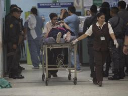 Los presuntos pandilleros entraron por la zona de urgencias y comenzaron a disparar indiscriminadamente. AP / L. Soto