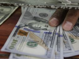 Se espera que el peso cotice entre 17.60 y 17.75 pesos por dólar en cotizaciones interbancarias a la venta. EL INFORMADOR / ARCHIVO