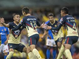 Jugadores del América celebran el gol en los últimos minutos. MEXSPORT / V. León