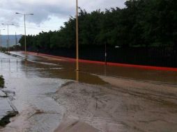 En la región de la Mixteca se reportaron daños materiales por las inundaciones en viviendas y caída de granizo por la onda tropical 30. TWITTER / @CEPCO_GobOax