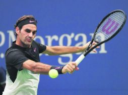 El suizo Roger Federer despachó, con algunos altibajos, al español Feliciano López y avanzó a la cuarta ronda. AFP /