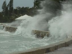 El huracán que llegó el miércoles a la isla en categoría cinco cobró la vida de tres personas. AP / T. Aylen