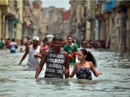 Sin importar donde están, los afectados por 'Irma' saben que lo que viene será difícil. EFE / R. Pujol