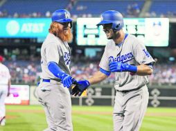 Los Dodgers tienen confirmado su boleto a la postemporada al ser el equipo que marcha con la mejor marca en las Grandes Ligas. AP /
