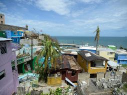 El huracán “María” impactó el pasado miércoles en Puerto Rico; hasta ahora ha dejado 16 muertos. AP / C. Giusti