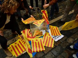 Más de 2.2 millones de catalanes participaron en la votación; el Gobierno español la consideró una simple escenificación. AP/A. Barrientos